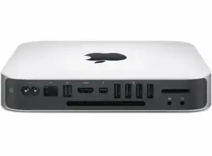 Old Apple Mac Mini running Home Assistant bare-metal with HAOS-kiosk displaying a home automation dashboard on a monitor