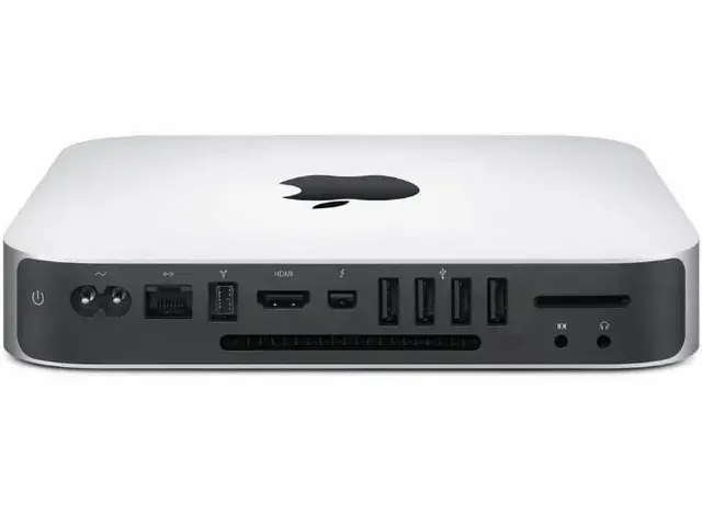 Old Apple Mac Mini running Home Assistant bare-metal with HAOS-kiosk displaying a home automation dashboard on a monitor